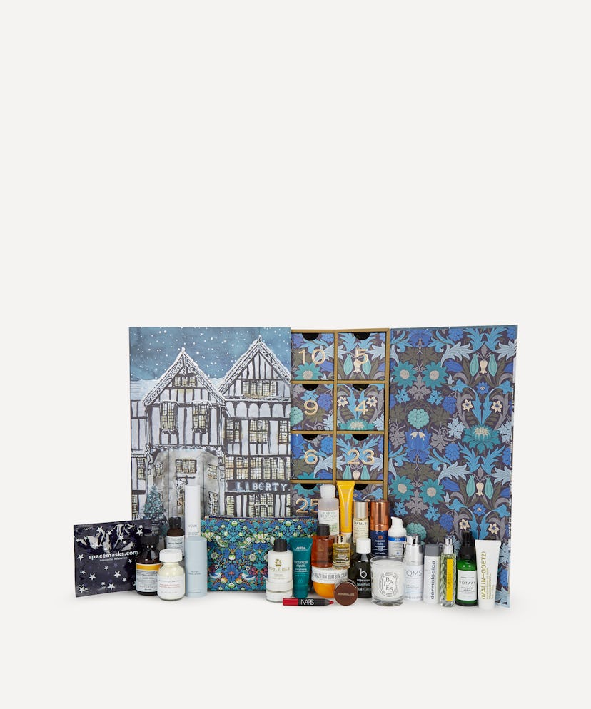 The inside of Liberty’s Beauty Advent Calendar 2020, which includes diptyque, Le Labo, NARS, and so ...
