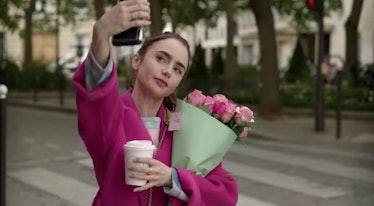 Emily (Lily Collins) takes a selfie with a fresh bouquet of roses and coffee. 