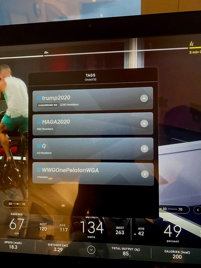 A screenshot of the Peloton app with Qanon hashtags.