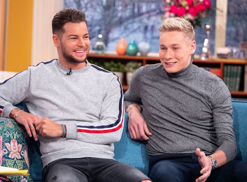 Chris and Ben Hughes appearing on ITV's this morning, both wearing grey jumpers with jeans and smili...