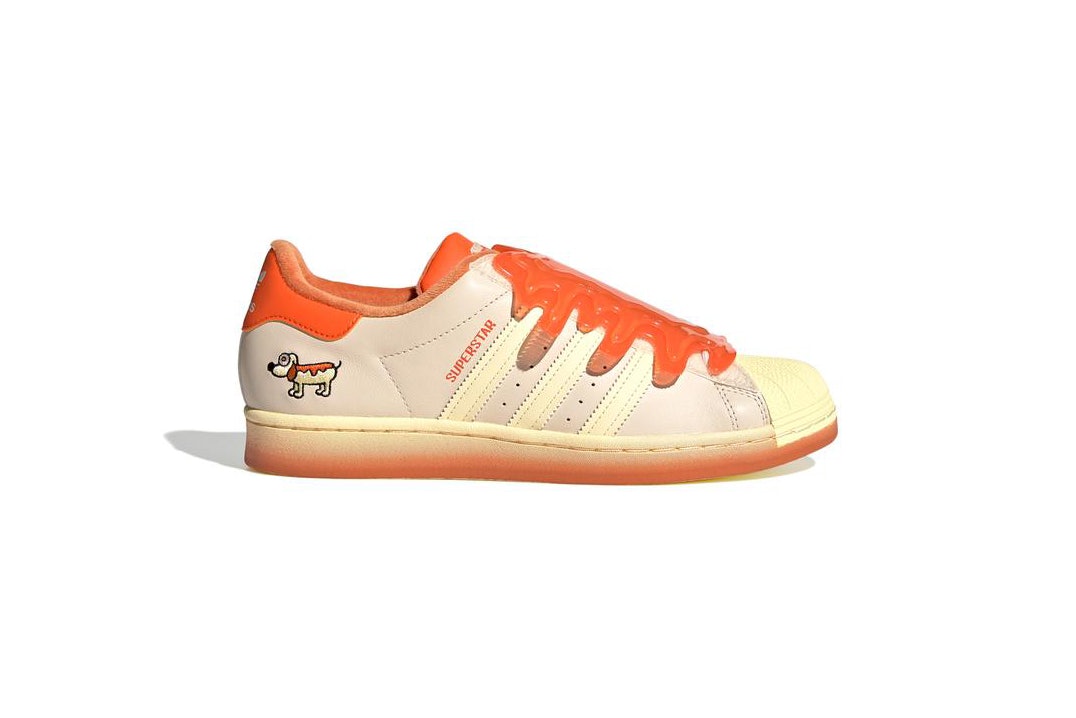sneakers with orange in them