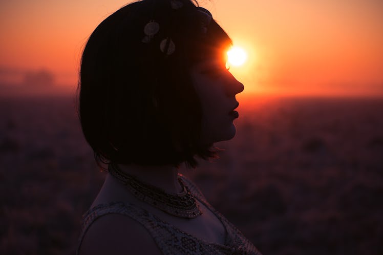Silhouette of girl on sunrise