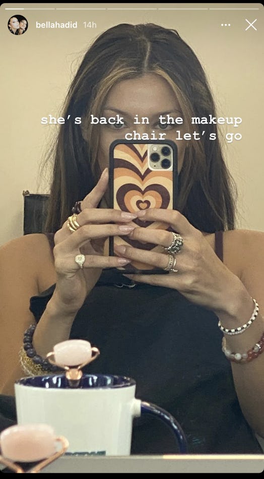 Bella Hadid in a mirror selfie showing off her new egirl hair.
