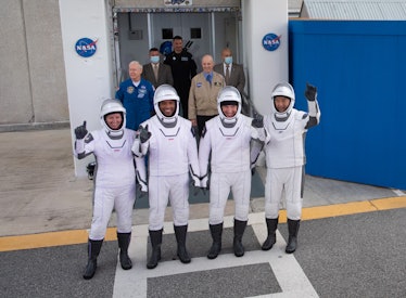 The crew walking out to the launchpad.