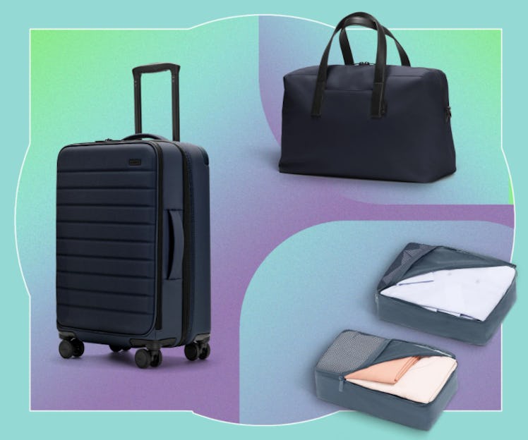 Three pieces of luggage are placed in front of a colorful backdrop.
