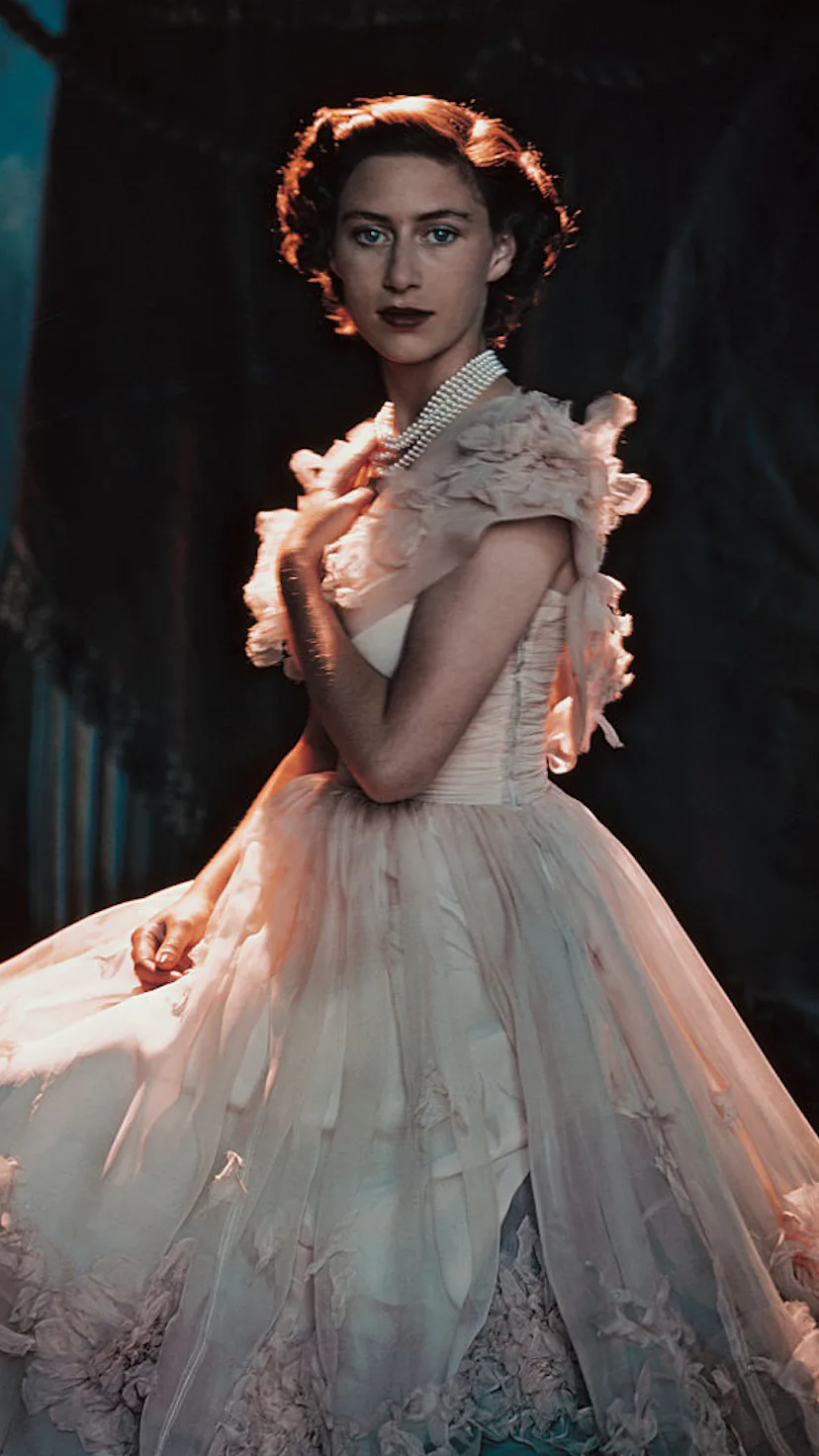 Princess Margaret wearing a pale pink gown with pearls around her neck