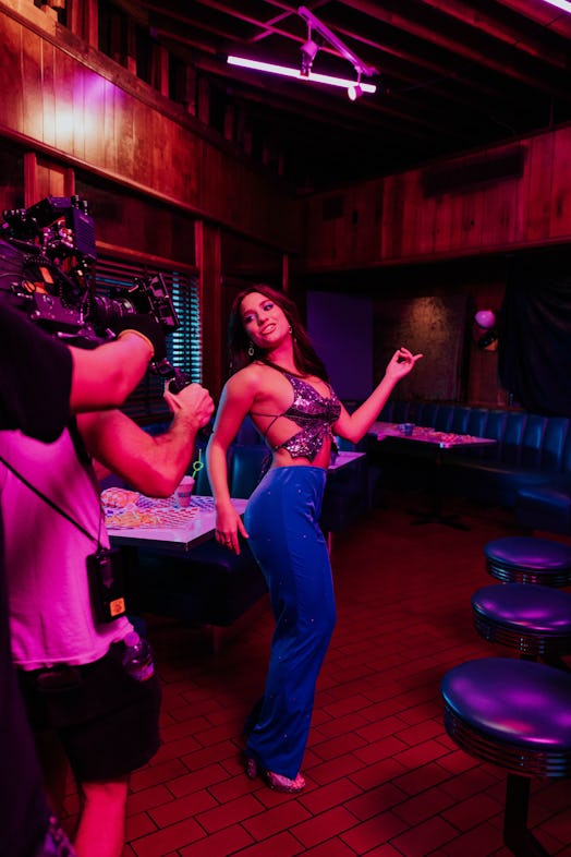 Zenzie Ziegler appears in her music video for 'Donuts.'