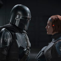 Pedro Pascal as Mando and Katee Sackhoff as Bo-Katan Kryze in 'The Mandalorian' via the Disney press...