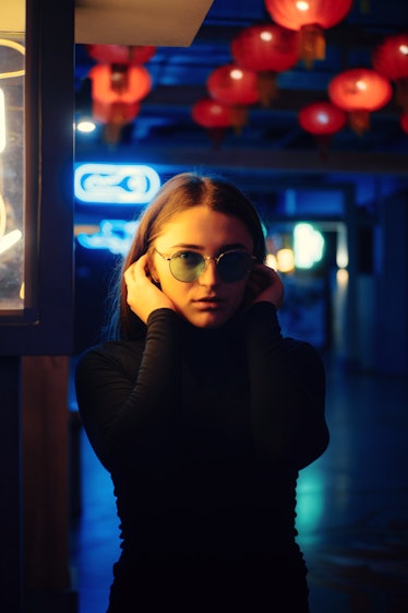 Young Woman In Glasses In Neon
