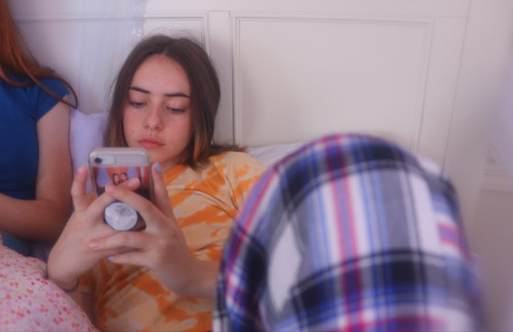 Teenage girl on her cell phone