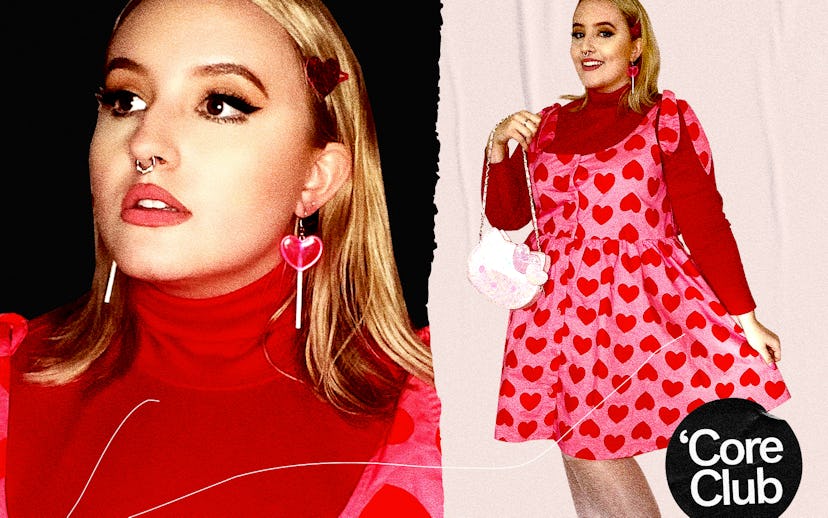 Model wearing pin dress with red hearts and red turtleneck under.