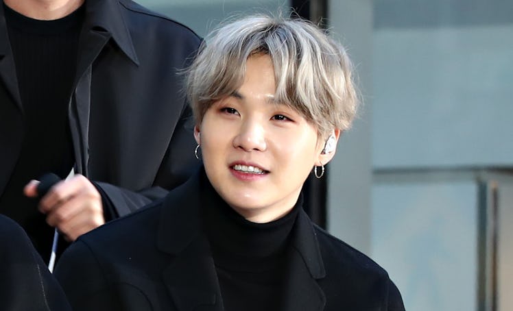 Suga gave an update on his surgery in a live video to BTS fans.