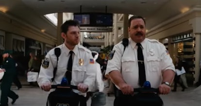 Two cops in a "Paul Blart: Mall Cop" movie scene