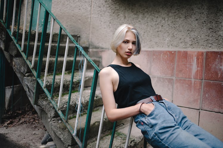 Woman standing near the stairway