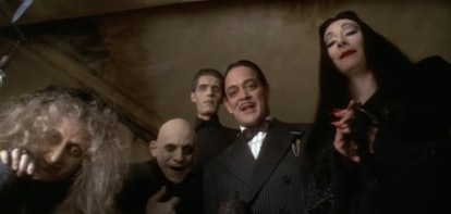 Five members of Addams family in a "Addams Family Values" movie scene