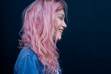 Young woman with pink hair