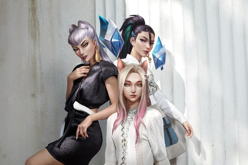 Members of the virtual pop group K/DA dressed by Louis Vuitton