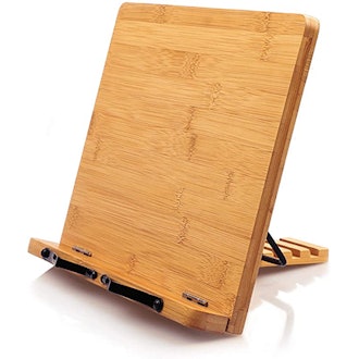 This sturdy bamboo book stand handles thick books and is angle-adjustable.