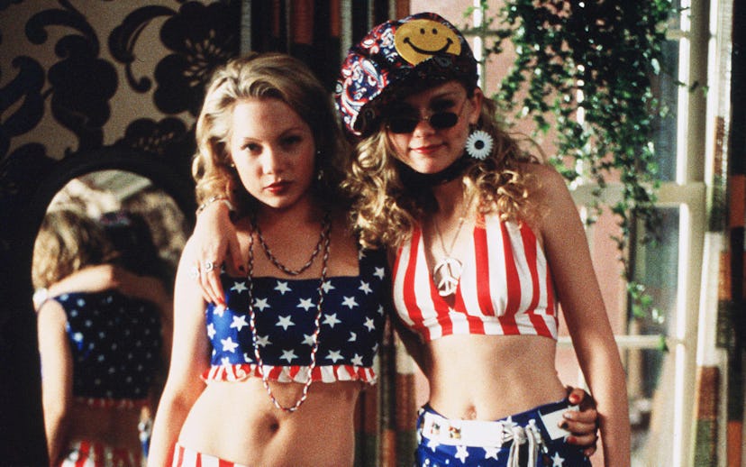  Michelle Williams & Kirsten Dunst wear crop tops rendered in stars and stripes from an American fla...