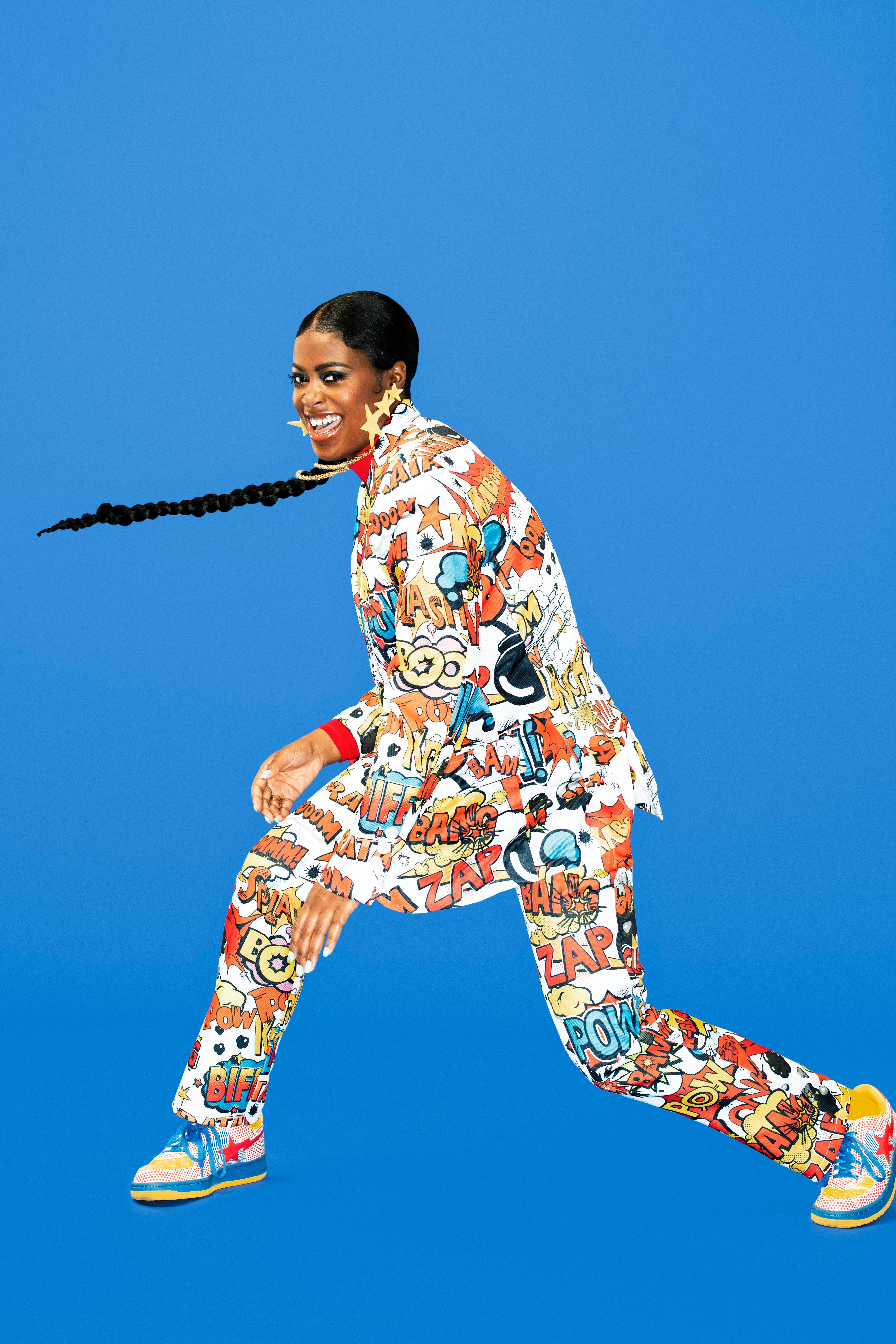 Cover of SOUNDCHECK featuring singer Tierra Whack wearing a colorful comic book style suit and pants...