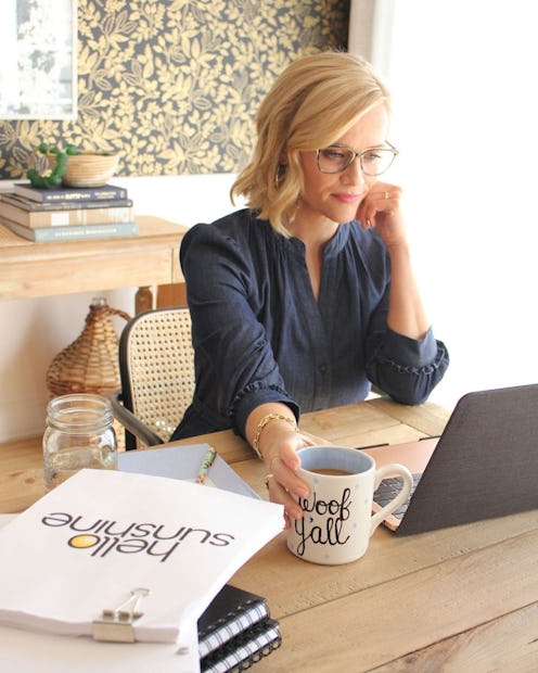 Reese Witherspoon's home office features a bright desk chair