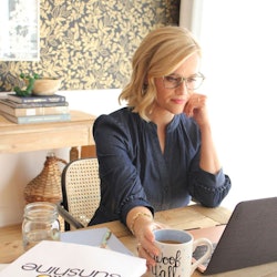 Reese Witherspoon's home office features a bright desk chair