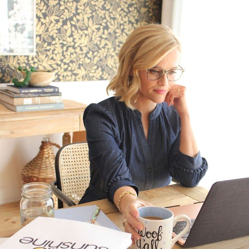 Reese Witherspoon's home office features a bright desk chair