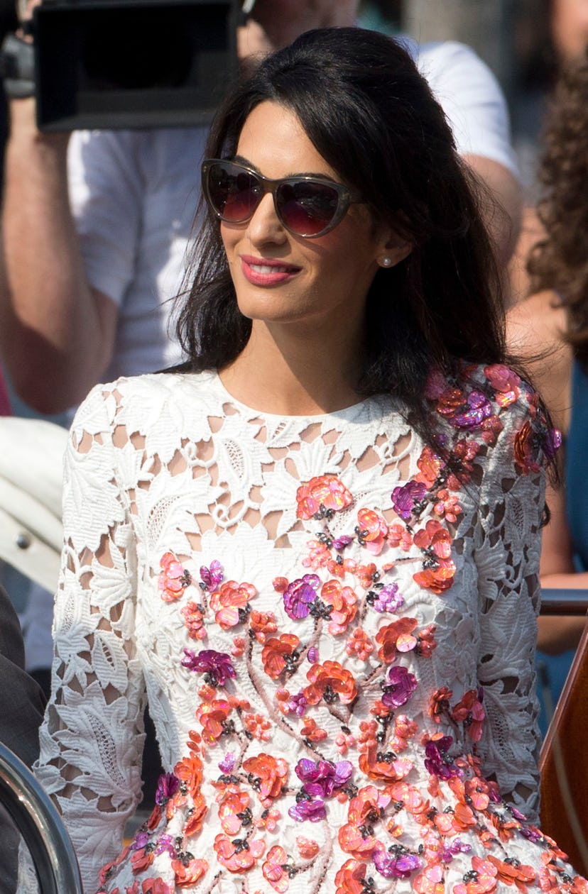 Amal Clooney's most iconic hairstyles: Wedding weekend with George Clooney.