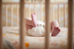 Baby sleeping in crib 
