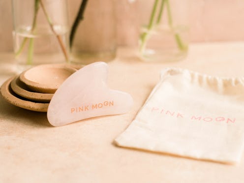 Pink Moon's gua sha tool is helpful for depuffing among other things.