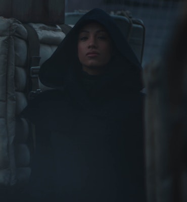 Sasha Banks as Koska Reeves in The Mandalorian wearing a black cape