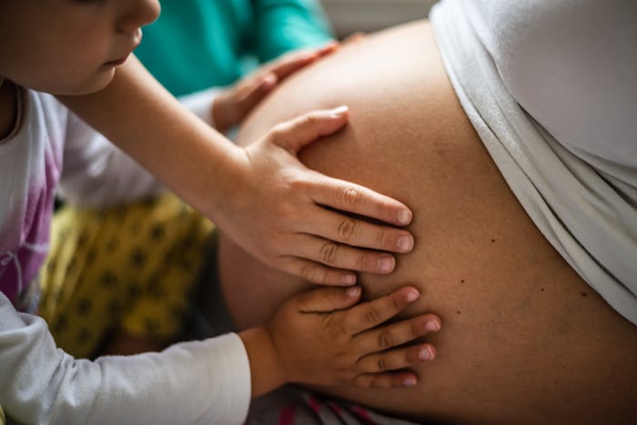 A pediatrician says your toddler might be able to tell if labor is near based on your own behavior.