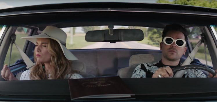 Alexis (Annie Murphy) and David (Dan Levy) drive in a car on 'Schitt's Creek.'