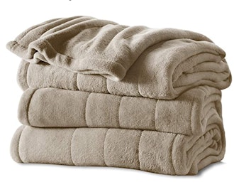 This heated blanket is one of the best warm blankets you can get with its plush fabric and multiple ...