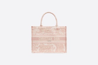 Dior's small pink toile de jouy embroidered book tote.