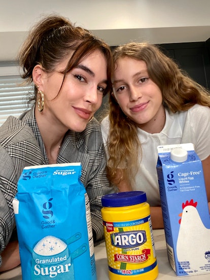 Influencer Brittany Xavier & Daughter Jadyn Demonstrate selfie with baking ingredients in front of t...