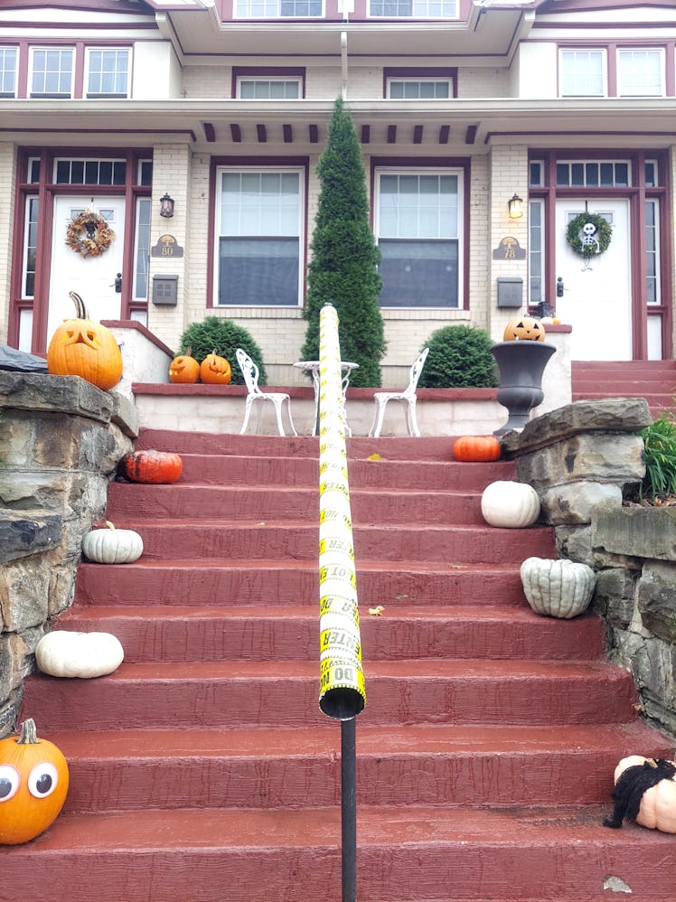 The view from the bottom of a steep set of stair; a candy chute awaits trick-or-treaters.