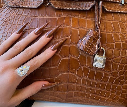 This winter, nail trends will reflect the fierce lengths of Kylie Jenner's, the opaque softness of B...