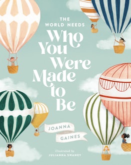 The cover of Joanna Gaines' new children's Who You Were Meant To Be featuring pastel hot air balloon...