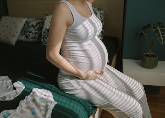 Pregnant Woman Sitting