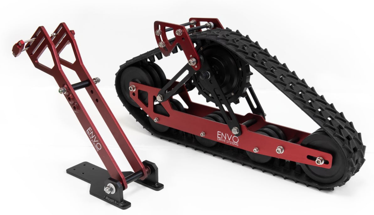 Turn your mountain bike into a pedalassisted snowmobile with this