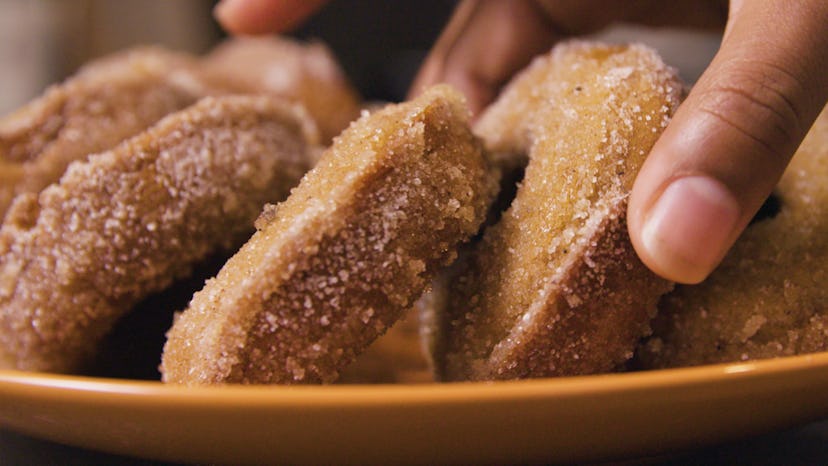 Fluffy baked apple cider donuts stacked on top of each other