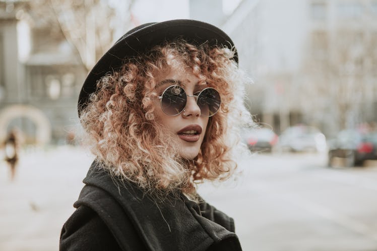Portrait of a fashionable girl dressed in black