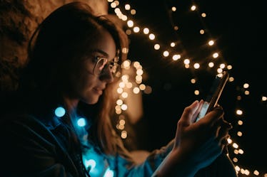 Young woman checking news