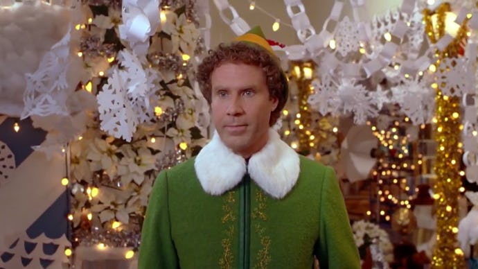 Will Ferrell in a green elf suit in "Elf"