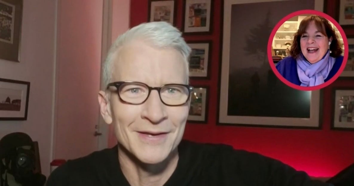 Anderson Cooper smiles as he speaks to cookbook author Ina Garten in a virtual interview.