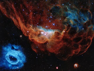Two vast planetary nebulae that are part of the Large Magellanic Cloud