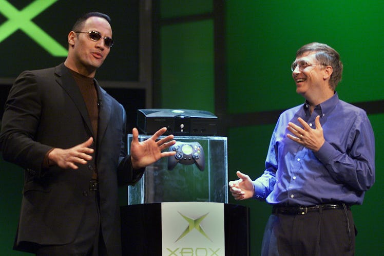 bill gates and the rock reveal the first xbox console in 2001