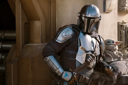 Mando and Grogu in 'The Mandalorian,' via Disney+ press site.