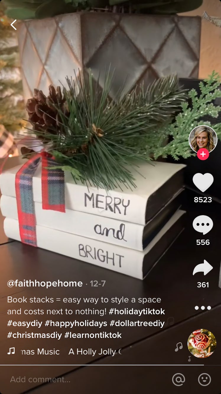 @faithhopehome shows her#artsmas skills by making a book stack that is merry and bright